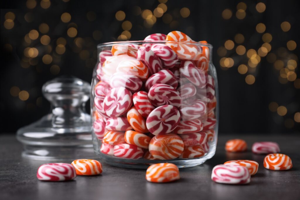 Closeup of assorted hard candies in jar